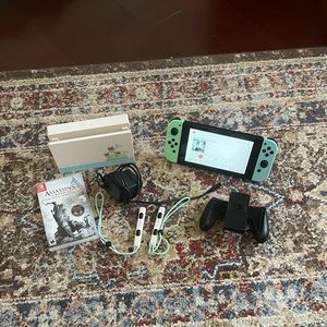 Nintendo Switch System: Animal Crossing: New Horizons Edition + Assassins Creed